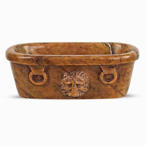 Model of yellow marble basin