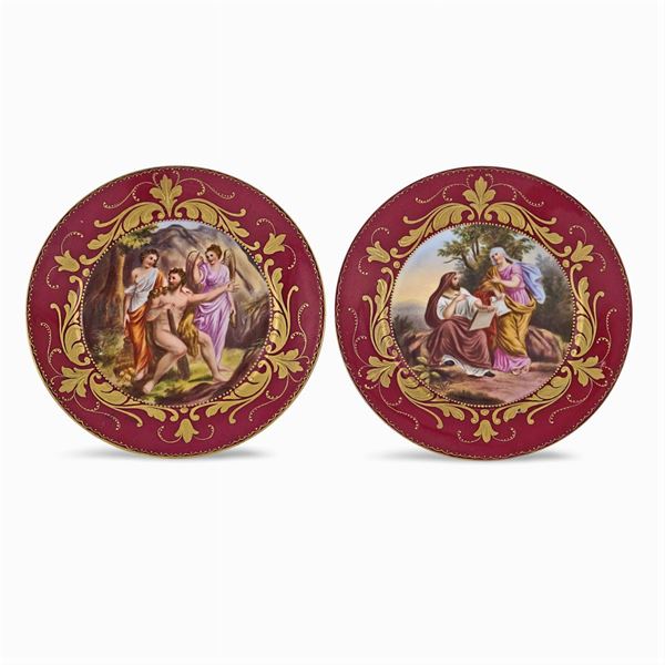 a pair of porcelain and gold plates