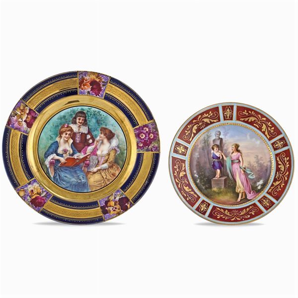 a pair of polychrome and gold plates