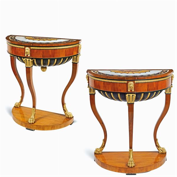 A pair of demilune consoles