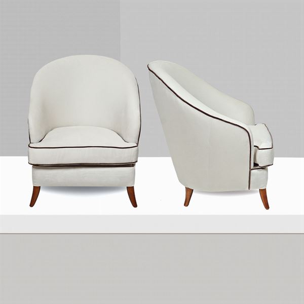 A pair of fabric armchairs