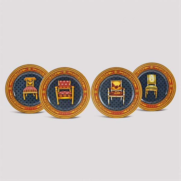 Gucci, set of four porcelain plates