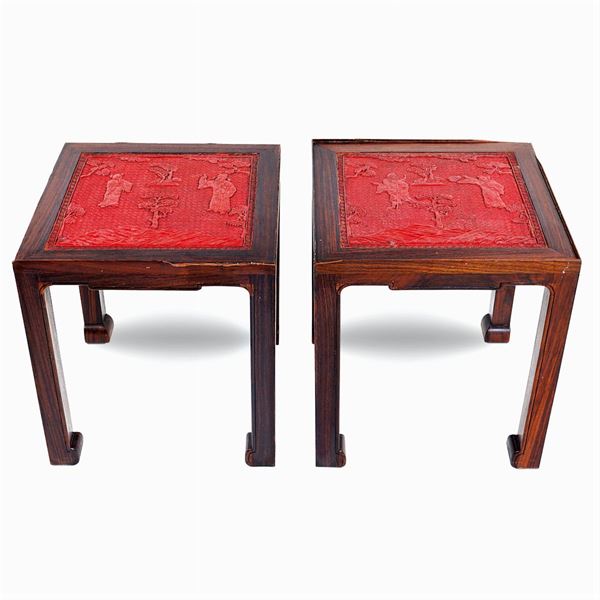 A pair of wood and lacquer tables