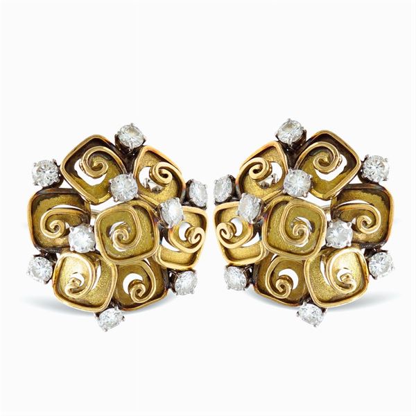 Ansuini, orecchini scultura in oro a due colori 18kt