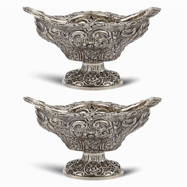 A pair of silver stands