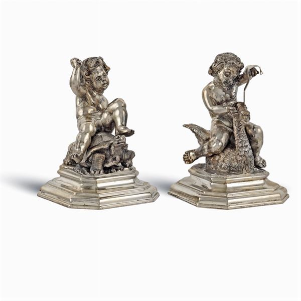 Coppia di sculture in argento