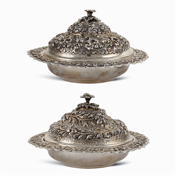 A pair of silver entree dish