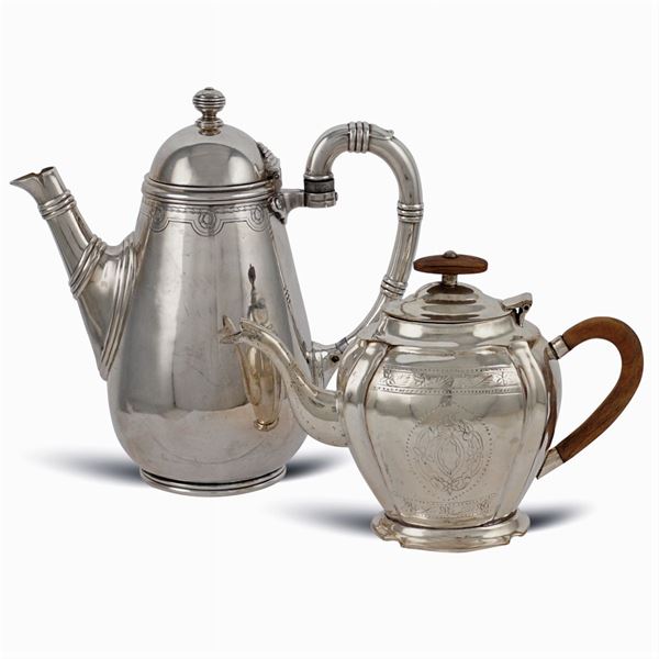 Two silver metal coffeepots