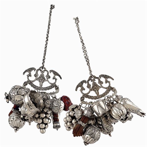 Two silver plated metal "Balanganda" amulets