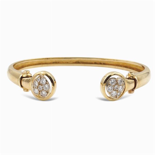 Bracciale a manetta in oro giallo 18kt