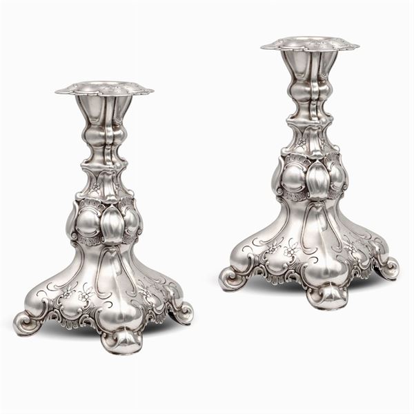 Pair of silver plated metal candlesticks