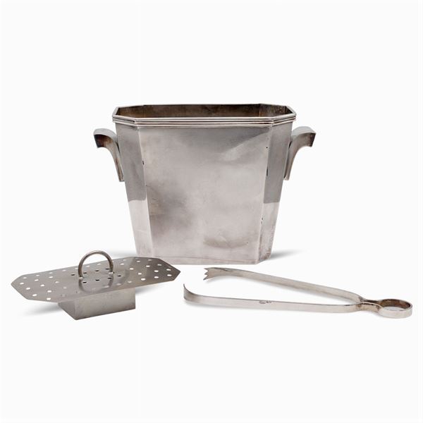 Silver ice bucket with ice tong