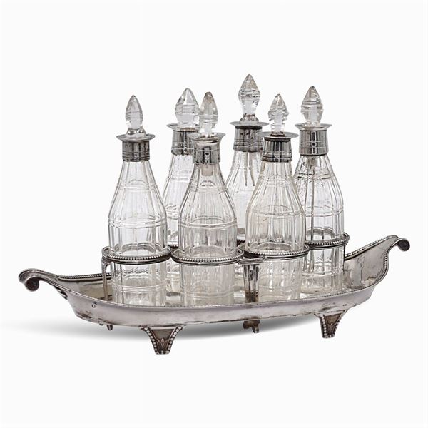 Silver and glass oil jug