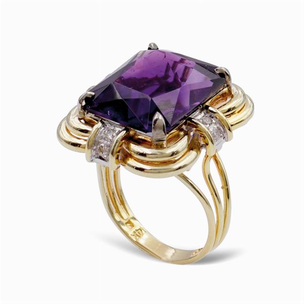 Anello in oro giallo e bianco 14kt con ametista
