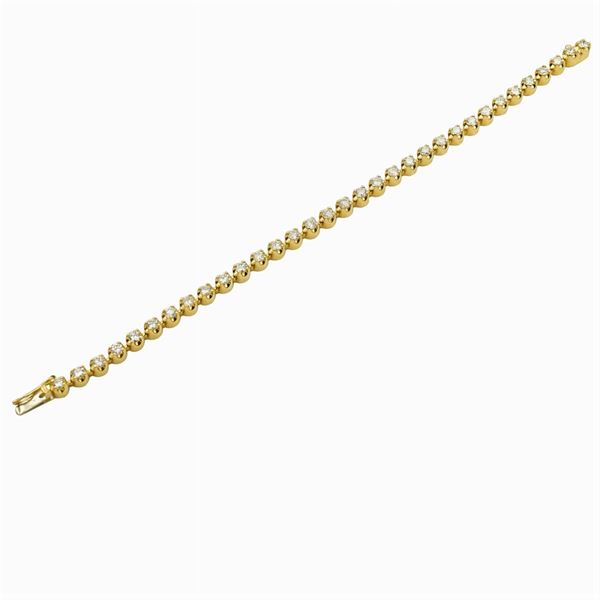 Bracciale tennis in oro giallo 14kt e diamanti