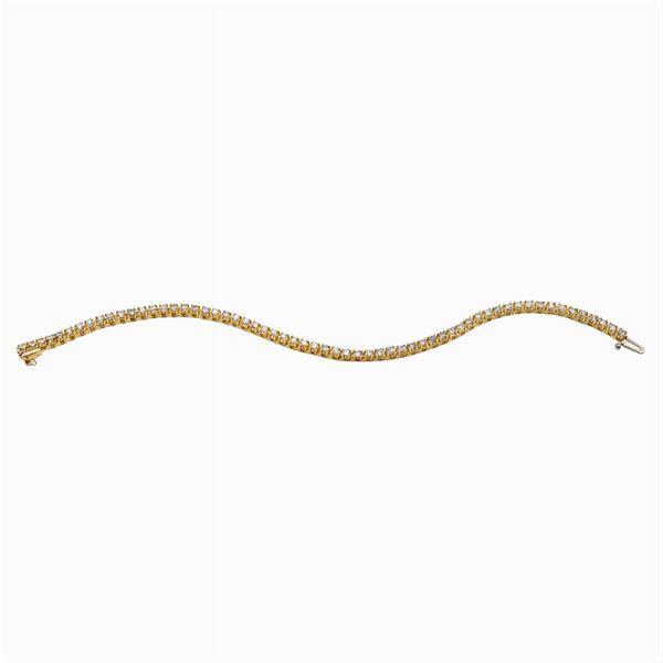 Bracciale tennis in oro giallo 14kt e diamanti