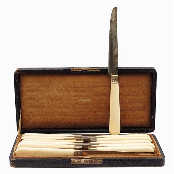 Twelve vermeil desert knives