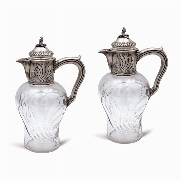 Pair of silver and glass jugs