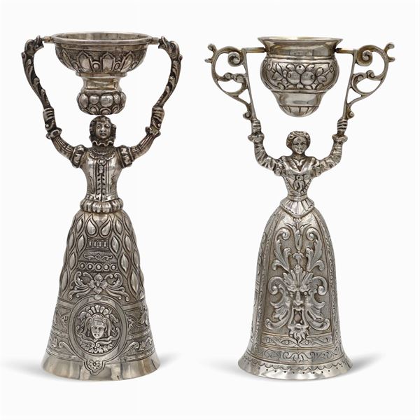 Two silver love cups