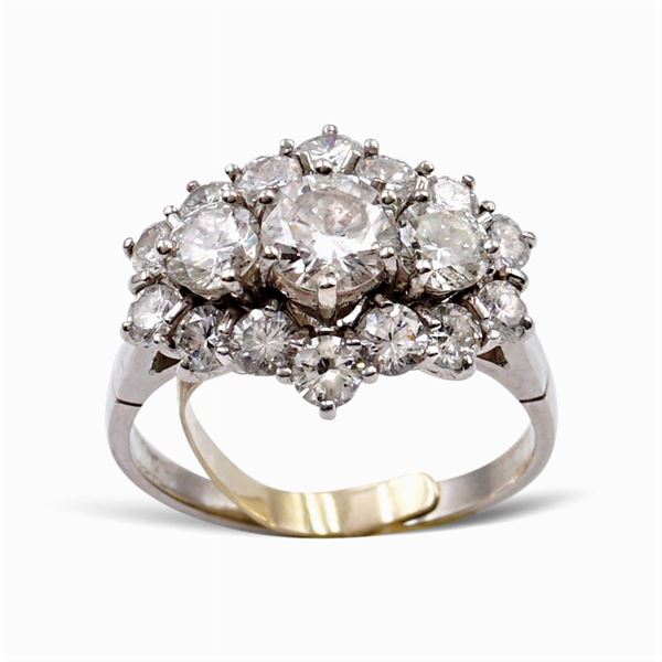 Anello in oro bianco 18kt con tre diamanti