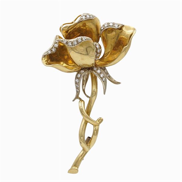 Spilla orchidea in oro giallo 18kt e diamanti