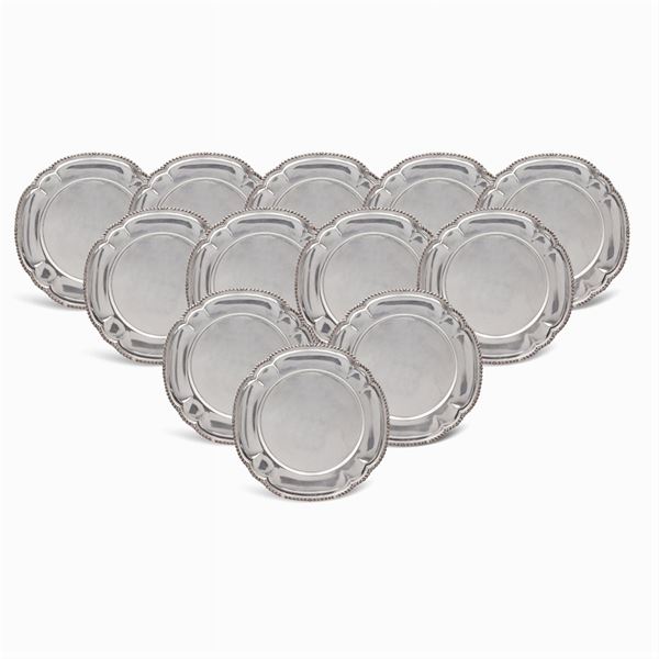 Twelve silver service plates
