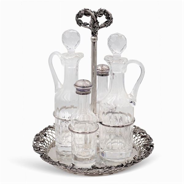 Silver and glass oil jug