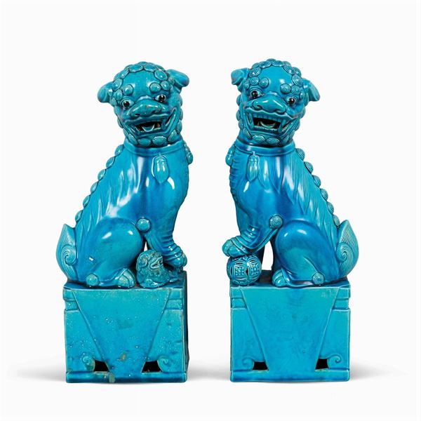 Coppia di sculture in terracotta invetriata