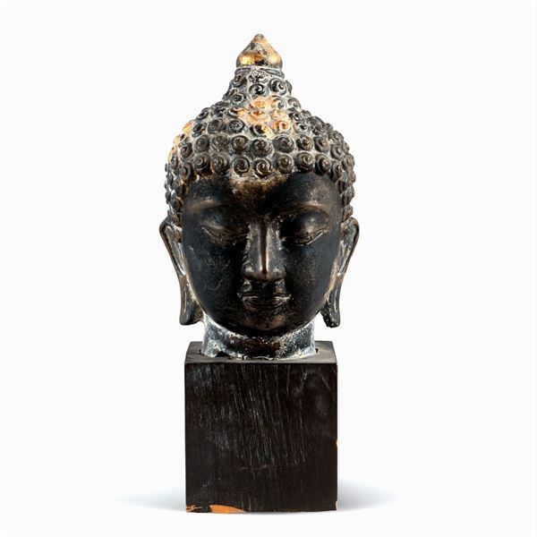 Scultura in bronzo raffigurante testa di Buddha