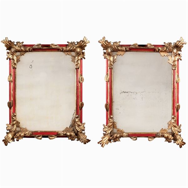 Pair of red lacquered wooden mirrors