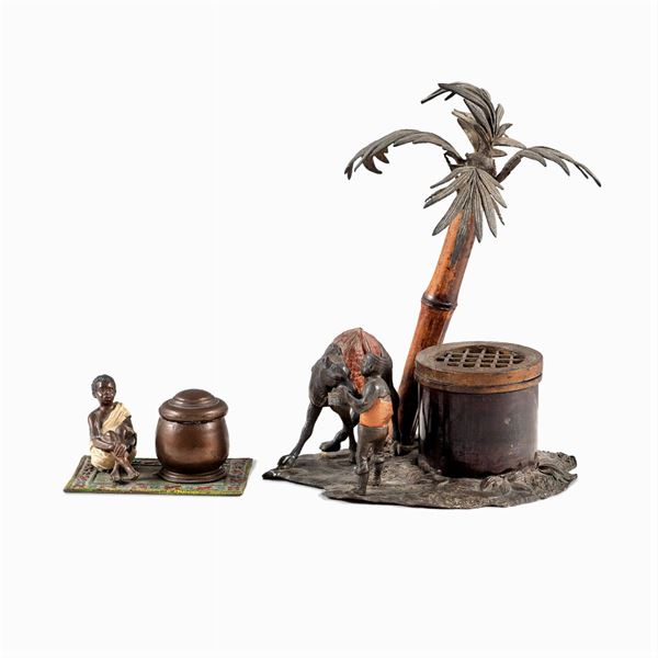 Two burnished bronze inkwells