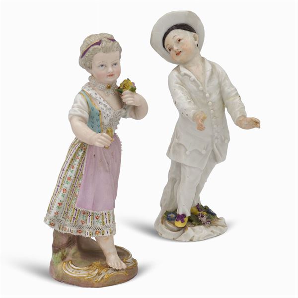 Two polychrome porcelain figures