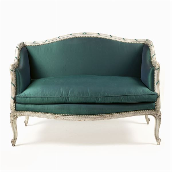 A lacquered wooden sofa