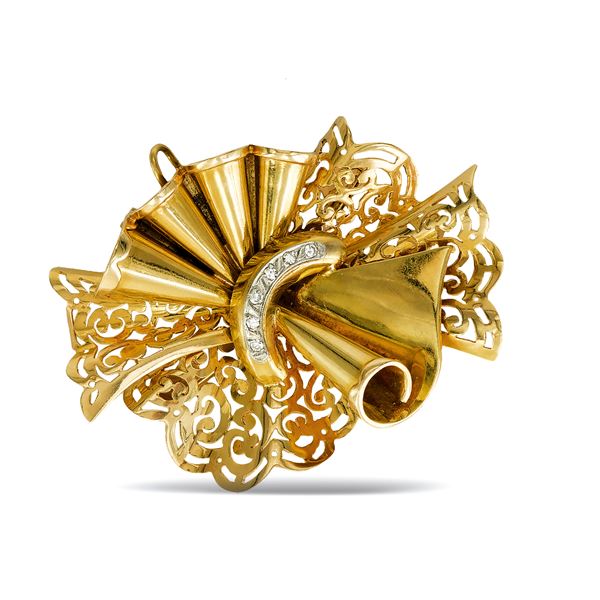 Spilla pendente a fiocco in oro giallo 18kt  (anni 40/50)  - Asta GIOIELLI E OROLOGI - Colasanti Casa d'Aste