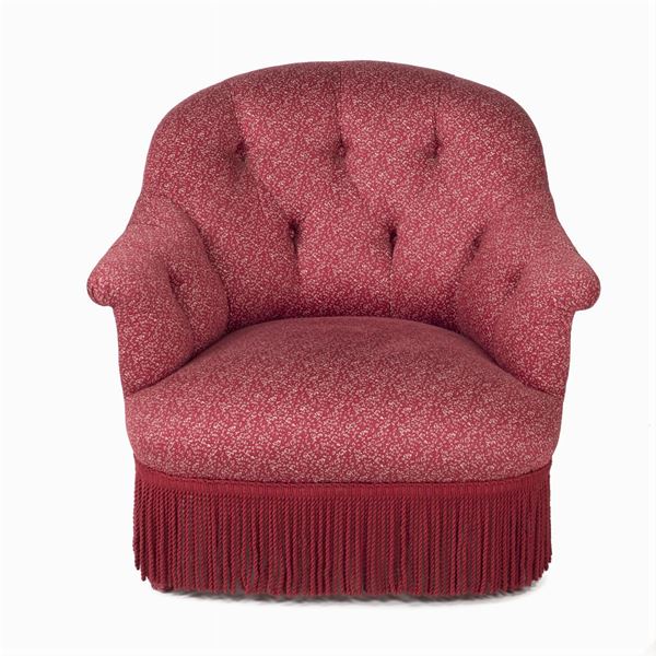 Upholstered and covered in fabric armchair