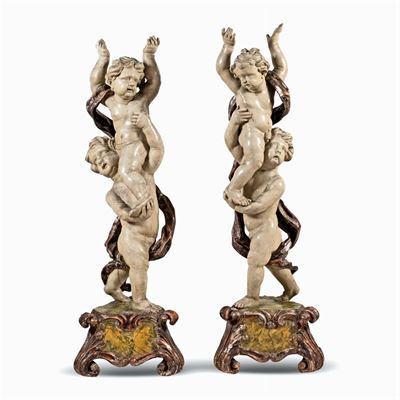 Coppia di Sculture in Legno Laccato e Dorato