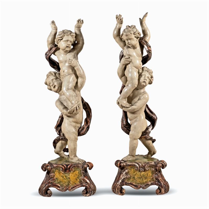Coppia di Sculture in Legno Laccato e Dorato