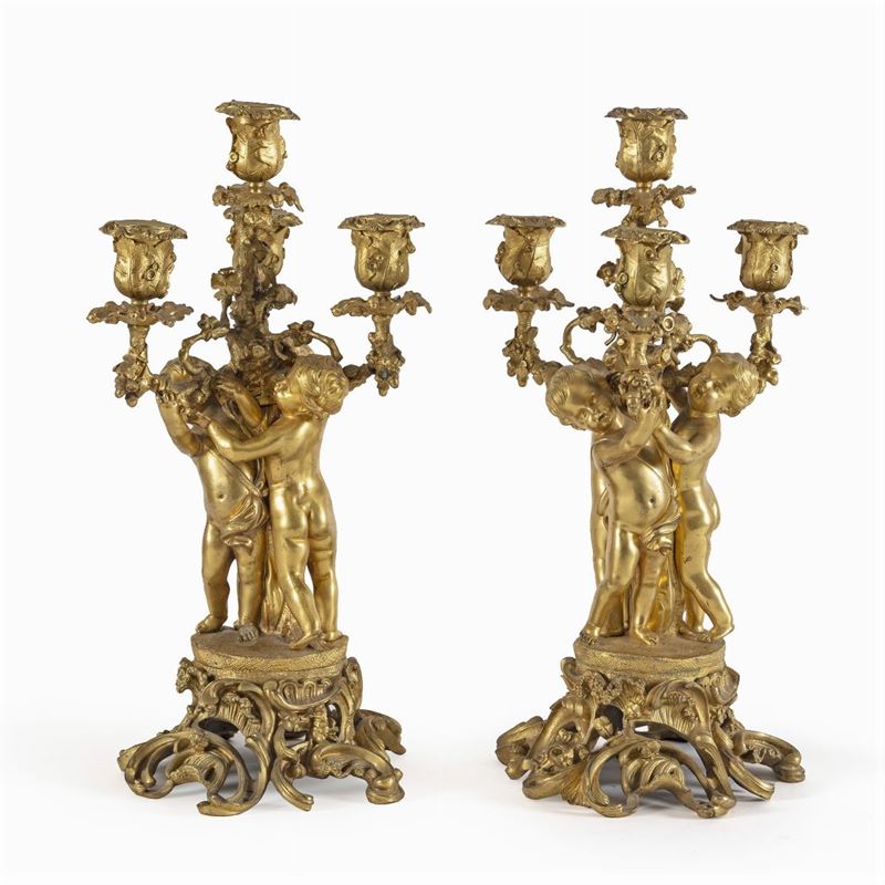 Coppia di Candelabri in Bronzo Dorato e Cesellato