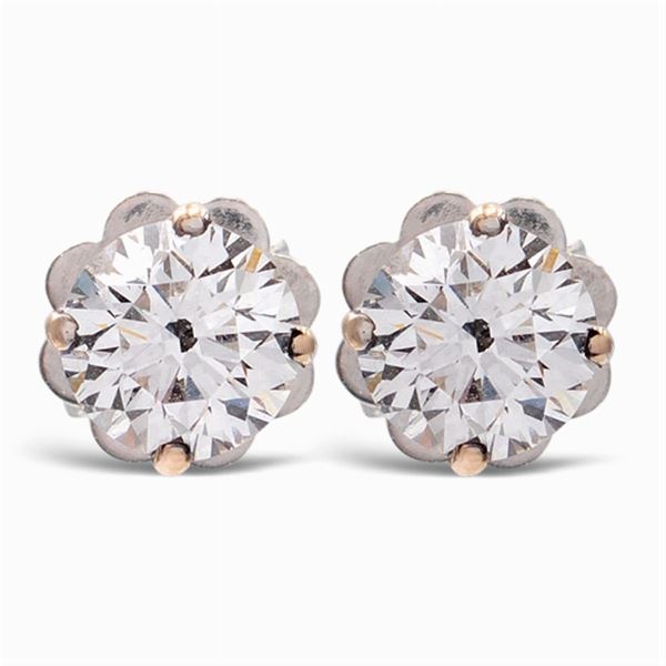 Orecchini in oro bianco 18kt e due diamanti