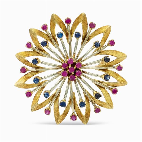 Spilla a motivo floreale in oro giallo 18kt