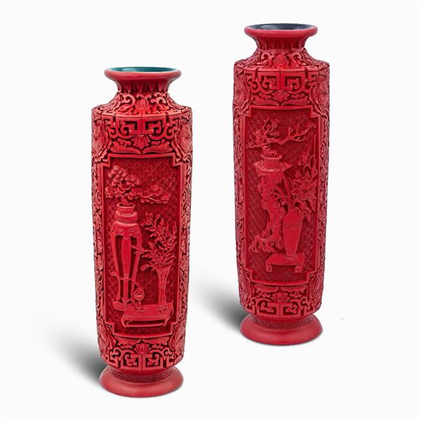Pair of red lacquer vases