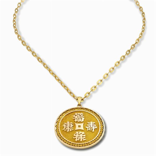 Pendente circolare in oro giallo 18kt