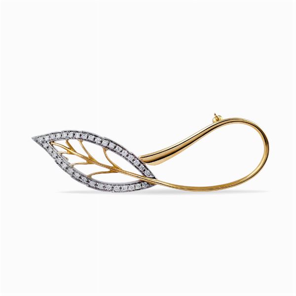 Spilla a foglia in oro giallo e bianco 18kt