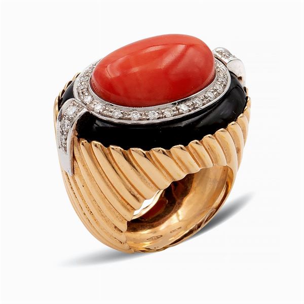 Anello a ponte in oro rosa 18kt con corallo rosso