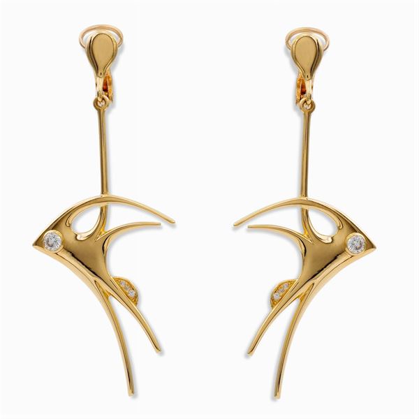 Orecchini scultura in oro giallo 18kt e diamanti