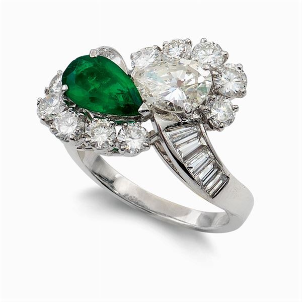 Platinum and natural emerald contrarié ring