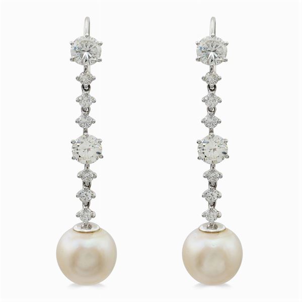 18kt white gold and diamond pendant earrings