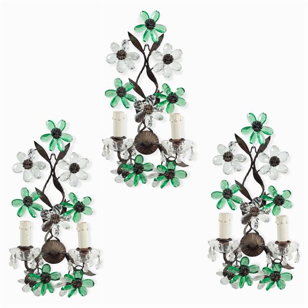 Three bronze and glass appliques