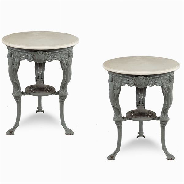 Pair of round cast iron coffee tables