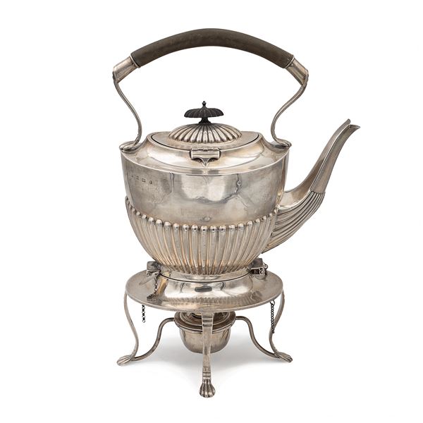 Silver tea kettle